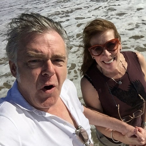 A picture of Kevin McNally travelling with his wife.